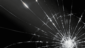 Spider web crack pattern on display